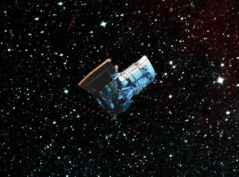 An artist's depiction of NEOWISE overlays the first asteroid image the mission took.